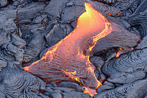 Pahoehoe lava flows from Pu'u O'o crater on Kilauea Volcano's southeast rift zone. Taken overhead from a helicopter.