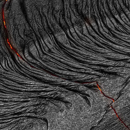 Pahoehoe lava flows from Pu'u O'o crater on Kilauea Volcano's southeast rift zone. Taken overhead from a helicopter.