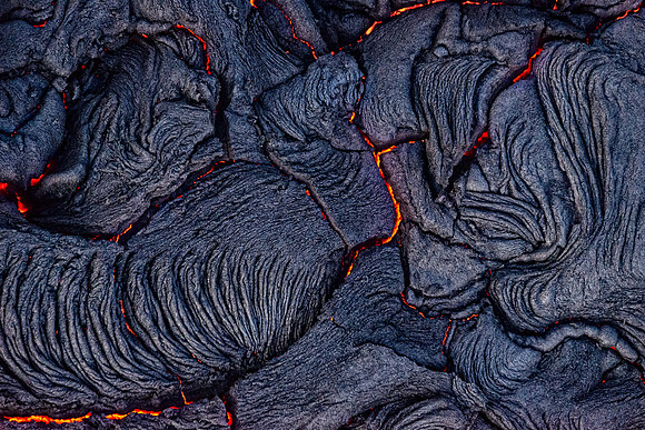 Pahoehoe lava flows from Pu'u O'o crater on Kilauea Volcano's southeast rift zone. Taken overhead from a helicopter.
