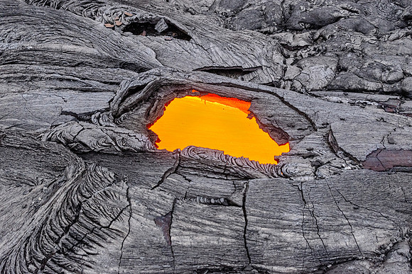 This skylight allowed a directly overhead look into a lava tube. The heat and smell of sulfur was almost overpowering even though we were a good hundred feet above.