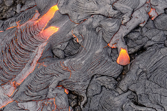 Pahoehoe lava flows from Pu'u O'o crater on Kilauea Volcano's southeast rift zone. Taken overhead from a helicopter.