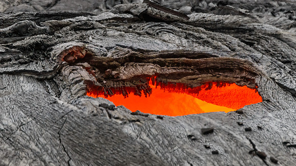 Another skylight in the Pu'u O'o lava tube system. This skylight resembled some sort of cauldron, kiln or furnace. If you look closely you can see the heat distorting the air.
