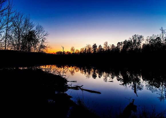 A sunset shot over a nearby lagoon in the waning days of winter in North Carolina.