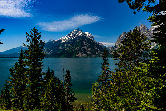 Viewing the Grand Tetons across Jenny Lake really gives perspective on the grandeur of these mountains and the surrounding terrain. The view didn't take my breath away but it came very close to litera
