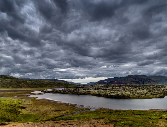 After a morning of exploring Thingvellir National Park in Iceland we headed to the Snæfellsjökull National Park area. On our way there we came across this fantastic view with very moody skies and a la