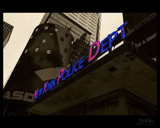 A selective color treatment of the iconic NYPD substation in New York's Times Square.