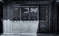 Black and white treatment of similar doors in the Forbidden City (to the color version).