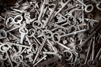 Just an abstract treated in black and white of a box of antique keys at a local flea market.