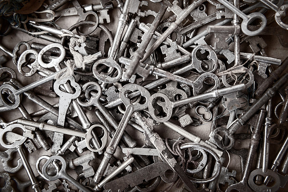 Just an abstract treated in black and white of a box of antique keys at a local flea market.