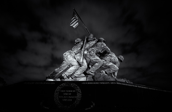Long exposure shot with black and white treatment of the USMC War Memorial.