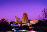 View of the Raleigh North Carolina skyline at rush hour in January.